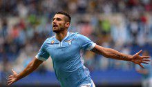 Lazio's midfielder Antonio Candreva celebrates after scoring during the Italian Serie A football match Lazio vs Chievo on September 15, 2013 at the Olympic stadium in Rome.  AFP PHOTO / ALBERTO PIZZOLI        (Photo credit should read ALBERTO PIZZOLI/AFP/Getty Images)