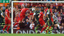 Liverpool's Daniel Agger handles the ball to concede a penalty during the Barclays Premier League match at Anfield, Liverpool. PRESS ASSOCIATION Photo. Picture date: Saturday August 17, 2013. See PA story SOCCER Liverpool. Photo credit should read: Peter Byrne/PA Wire. RESTRICTIONS: Editorial use only. Maximum 45 images during a match. No video emulation or promotion as 'live'. No use in games, competitions, merchandise, betting or single club/player services. No use with unofficial audio, video, data, fixtures or club/league logos.