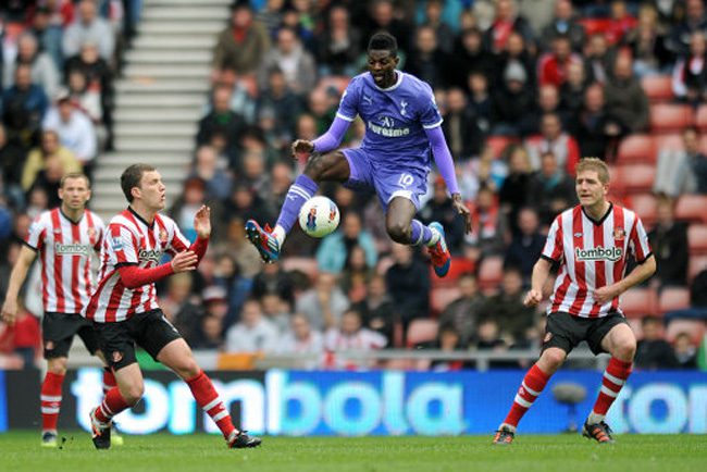 Tottenham Hotspur's Emmanuel Adebayor (centre) in action against Sunderland